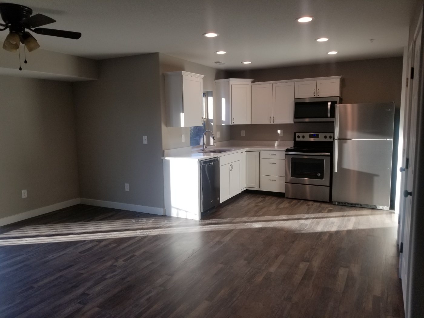 Open living and kitchen area in a finished unit