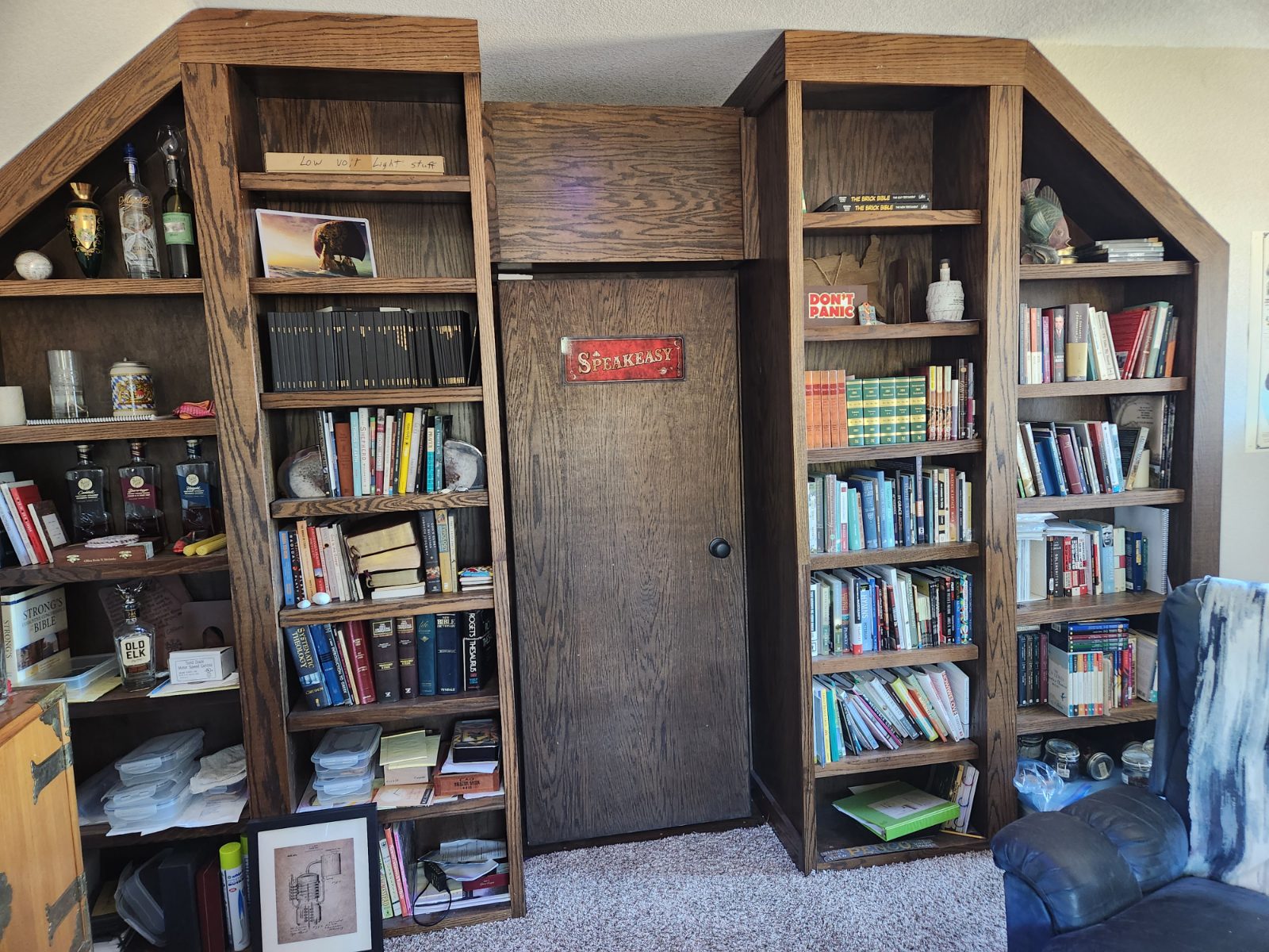 The speakeasy side of the bookcase door, marked Speakeasy